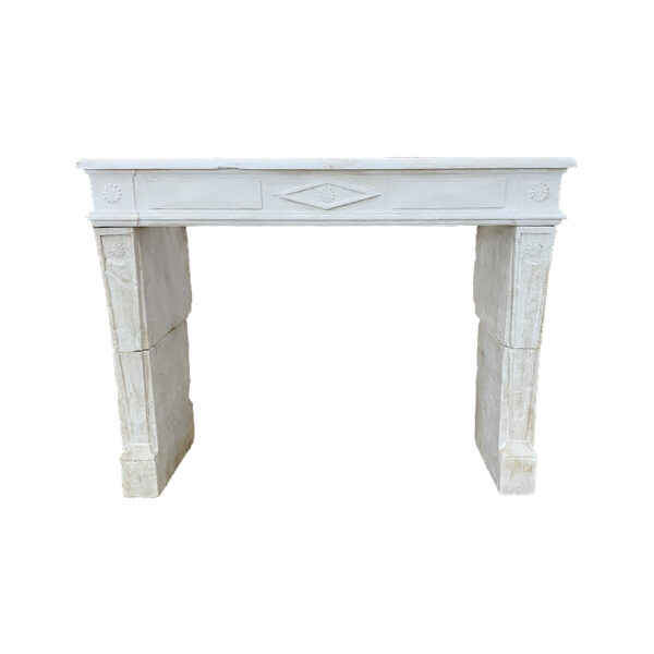 Antique directoire style stone fireplace