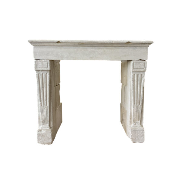 Antique Louis Philippe style limestone fireplace