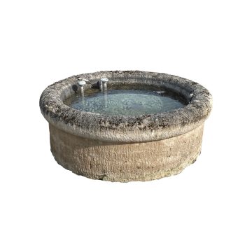Antique pool in French limestone with water