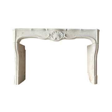 Antique Louis XV fireplace in French limestone