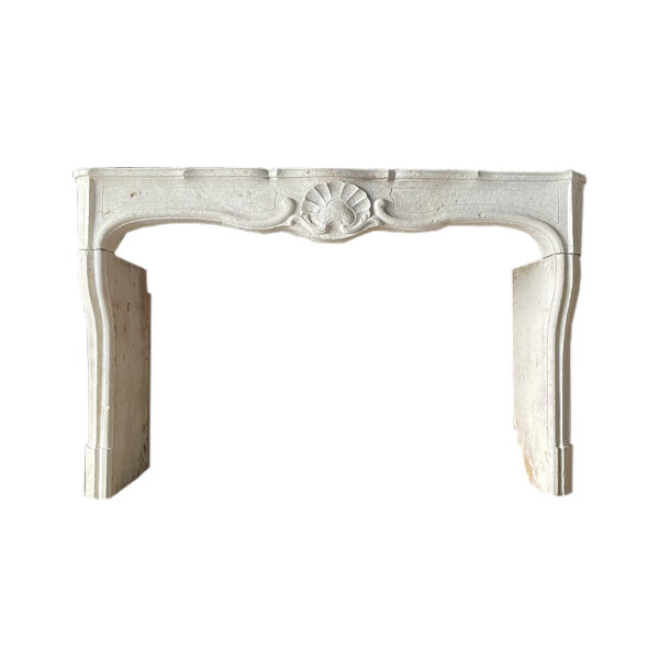 Antique Louis XV fireplace in French limestone