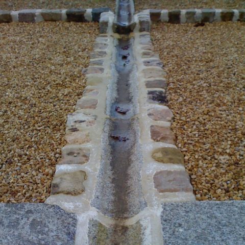 old granite stone channel recovery fed water rill