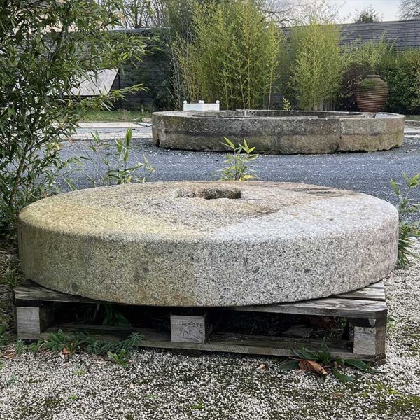 ancient apple press grindstone