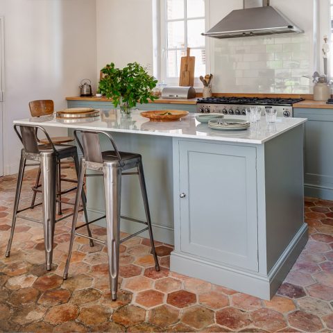 modern kitchen with antique terracotta tiles
