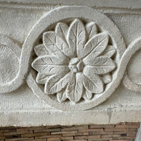 sculpted flower reclaimed fireplace