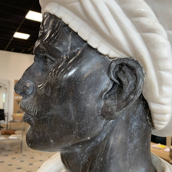 Man from sudan bust in stone