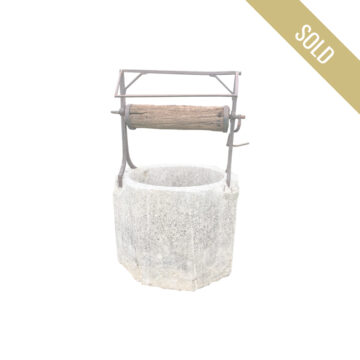 antique octogonal limestone well head