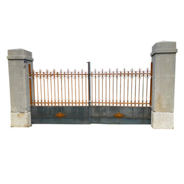 Massive stone gateway with double French gates