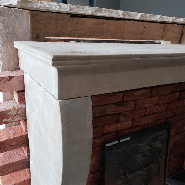 stone fireplace mantel with molding