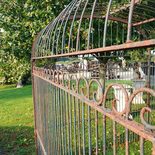 antique aviary with round bars and scrollwork