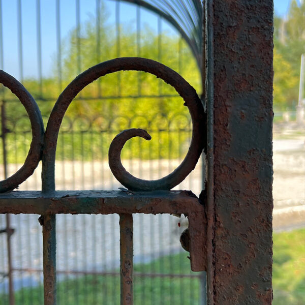 antique decorative aviary with scrollwork