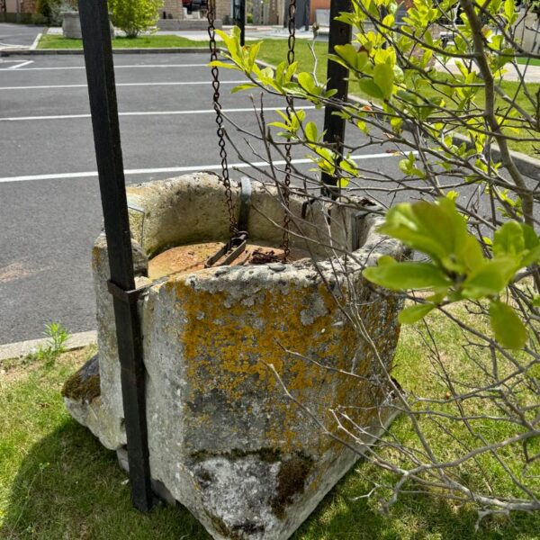 antique stone well curb
