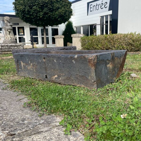 antique trough in honed stone slate
