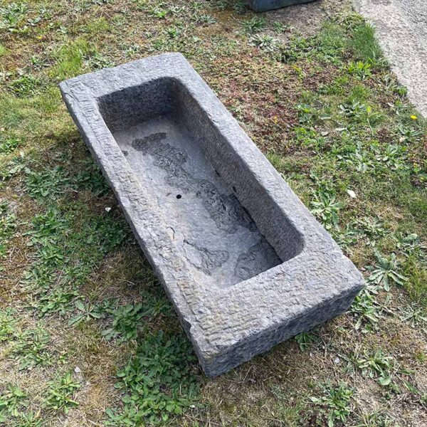 antique trough in natural slate