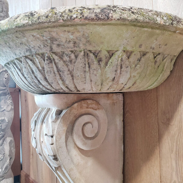 basin with carved leaf