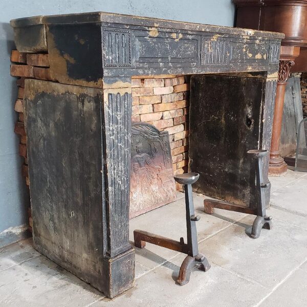 antique painted stone fireplace with patina