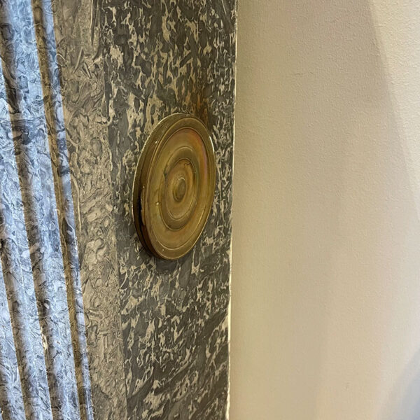Marble fireplace with ventilation opening