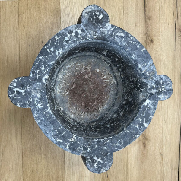 mortar in antique black marble