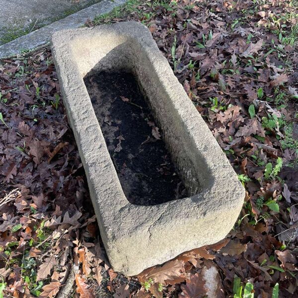 antique granite trough with raw look