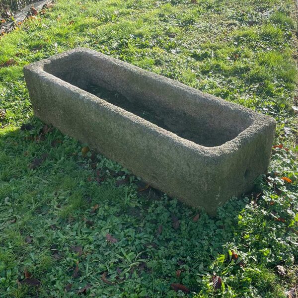 antique trough in natural granite stone