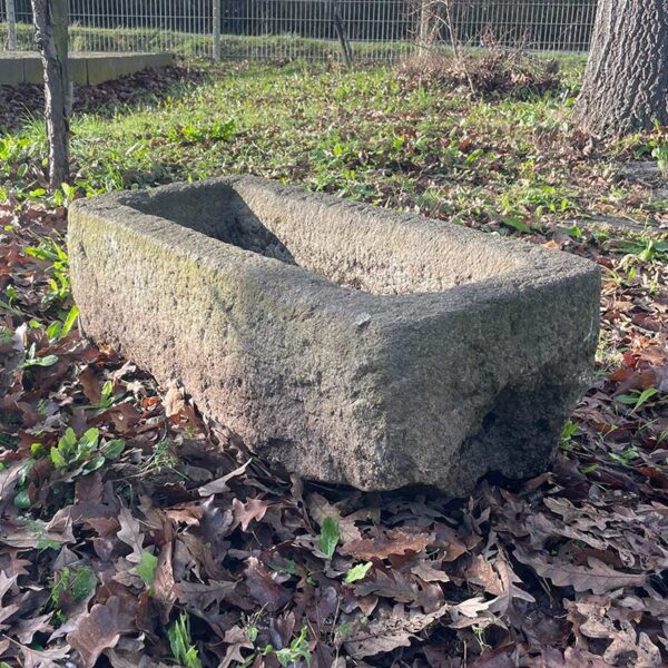 antique trough with rough edge