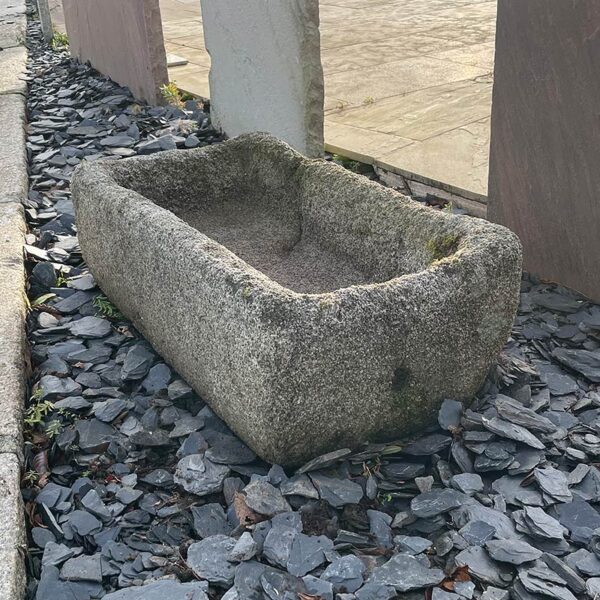 granite trough with grainy texture