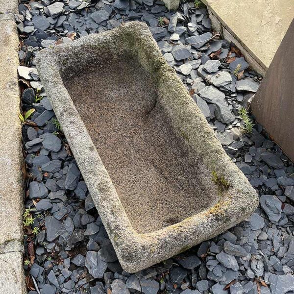 interior of very rustic granite trough