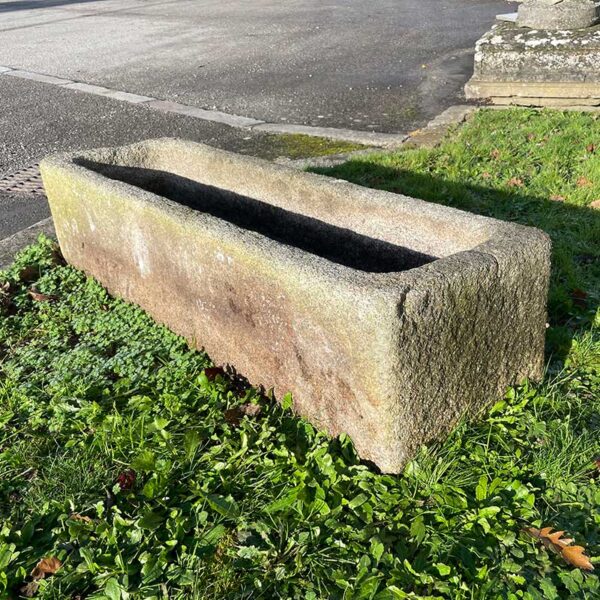 large granite trough with rounded edges