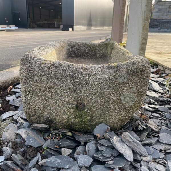rustic granite trough with hole
