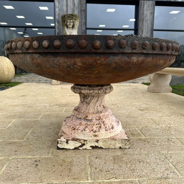 antique bowl on cast iron base