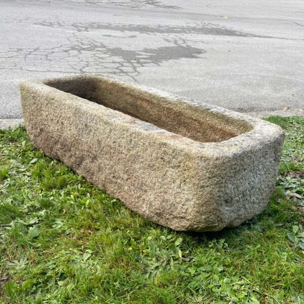 antique granite trough with raw look