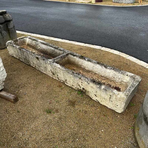 antique trough with two stone basins