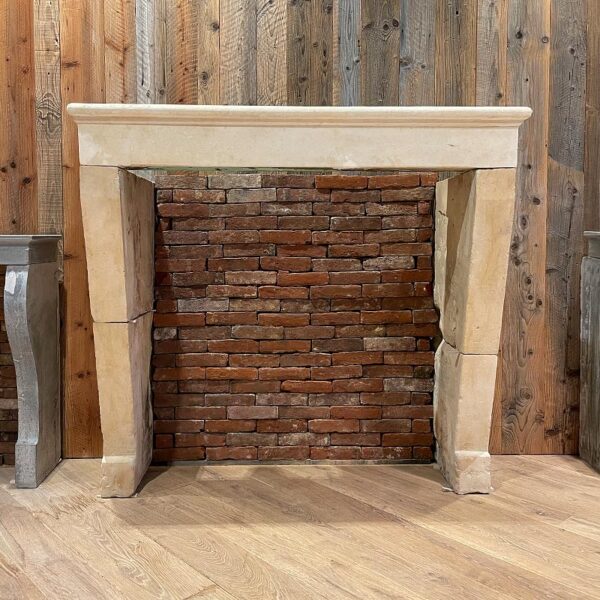 French Sarthe style stone fireplace