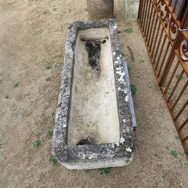 generous antique stone trough