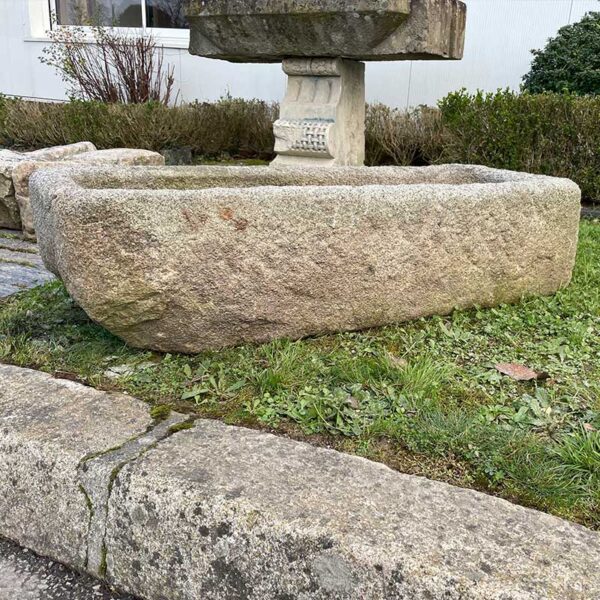 large granite stone trough