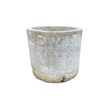 large round limestone vat