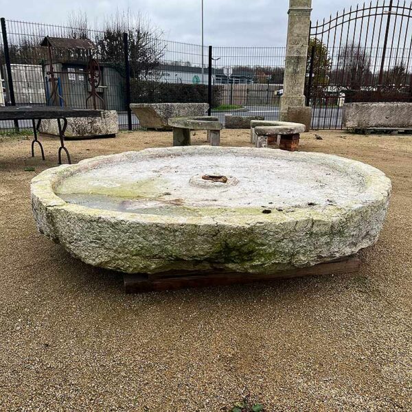 round fountain in stone