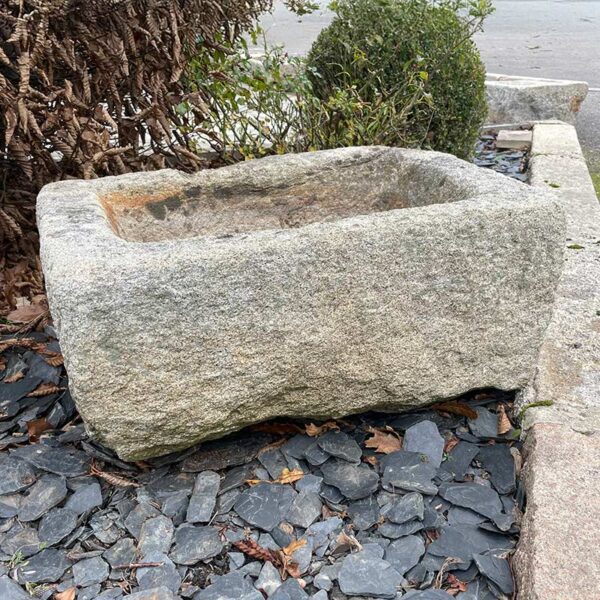 small antique trough in granite