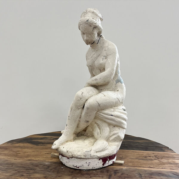 small statue naked woman