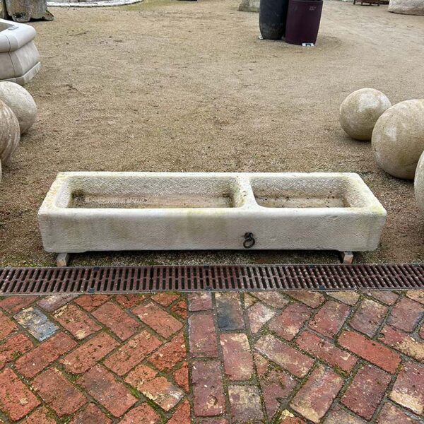 two basin trough weathered limestone