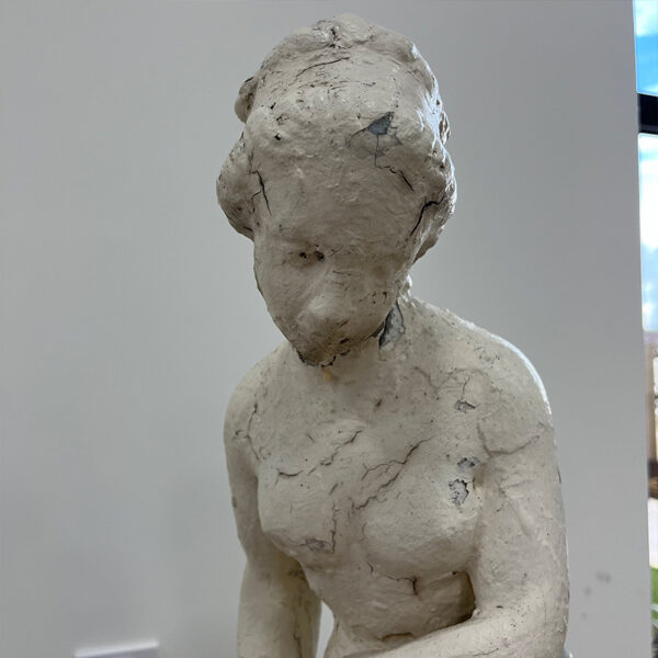 white patinated woman statue