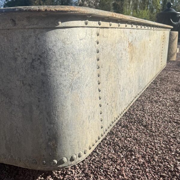 antique patinated iron trough
