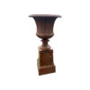 cast iron medici vase on a pedestal