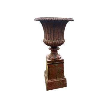 cast iron medici vase on a pedestal