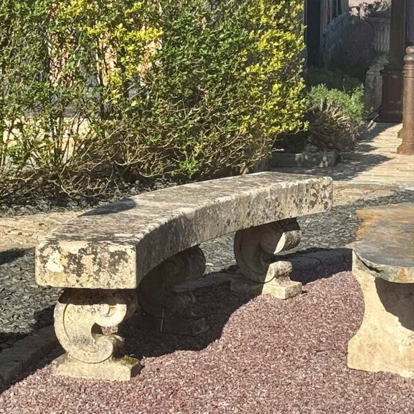 curved antique stone bench