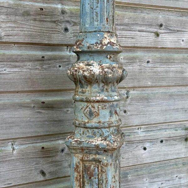 fluted shaft of antique street lamp post