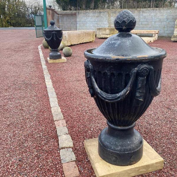 pair of antique cast iron black urns