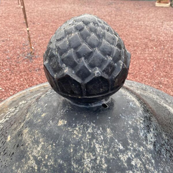 reclaimed cast iron urn with pinecone