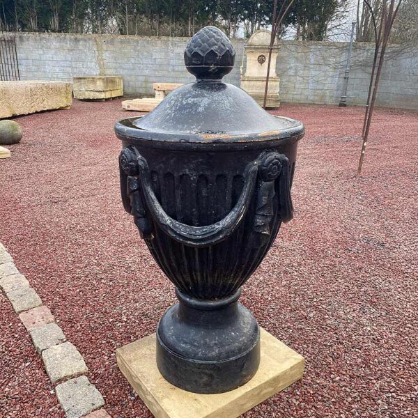 two majestic cast iron black urns