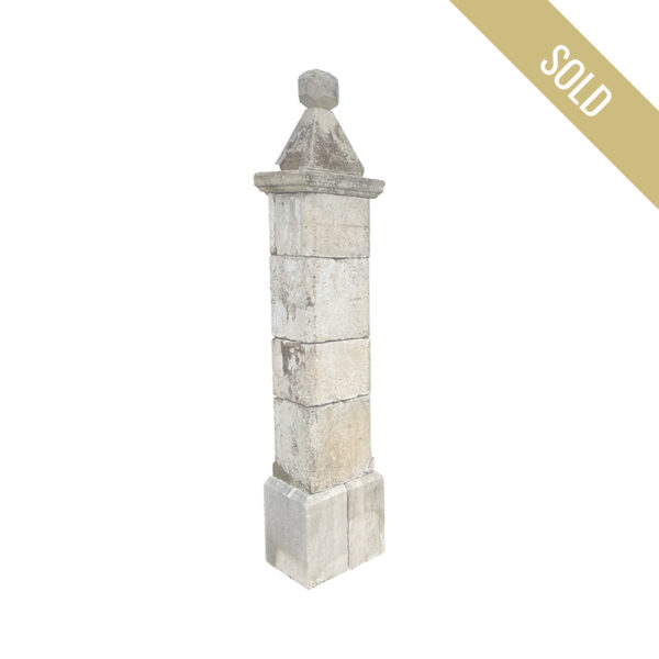antique limestone gate pillars with pyramid capping